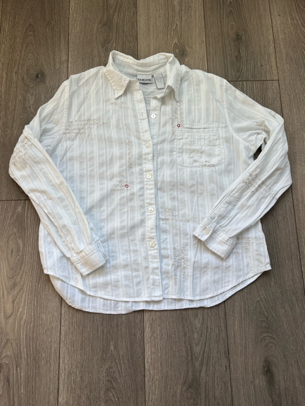 Chico’s Sz 2 (L) 100% cotton, white, vertical lines, button up long sleeved